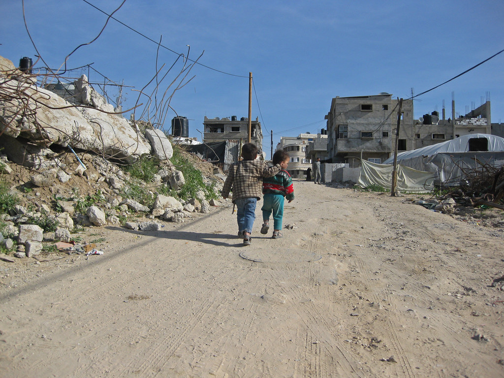 Children walking down a road